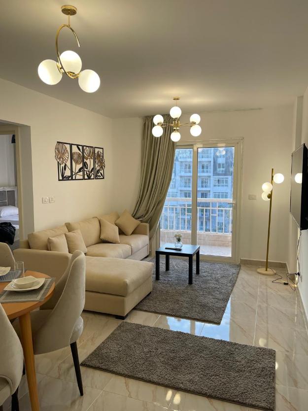 شقه للايجار  المفروش  بمدينتي 74متر في الb12